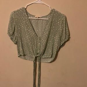 Brand pacsun in a light green color with white flowers